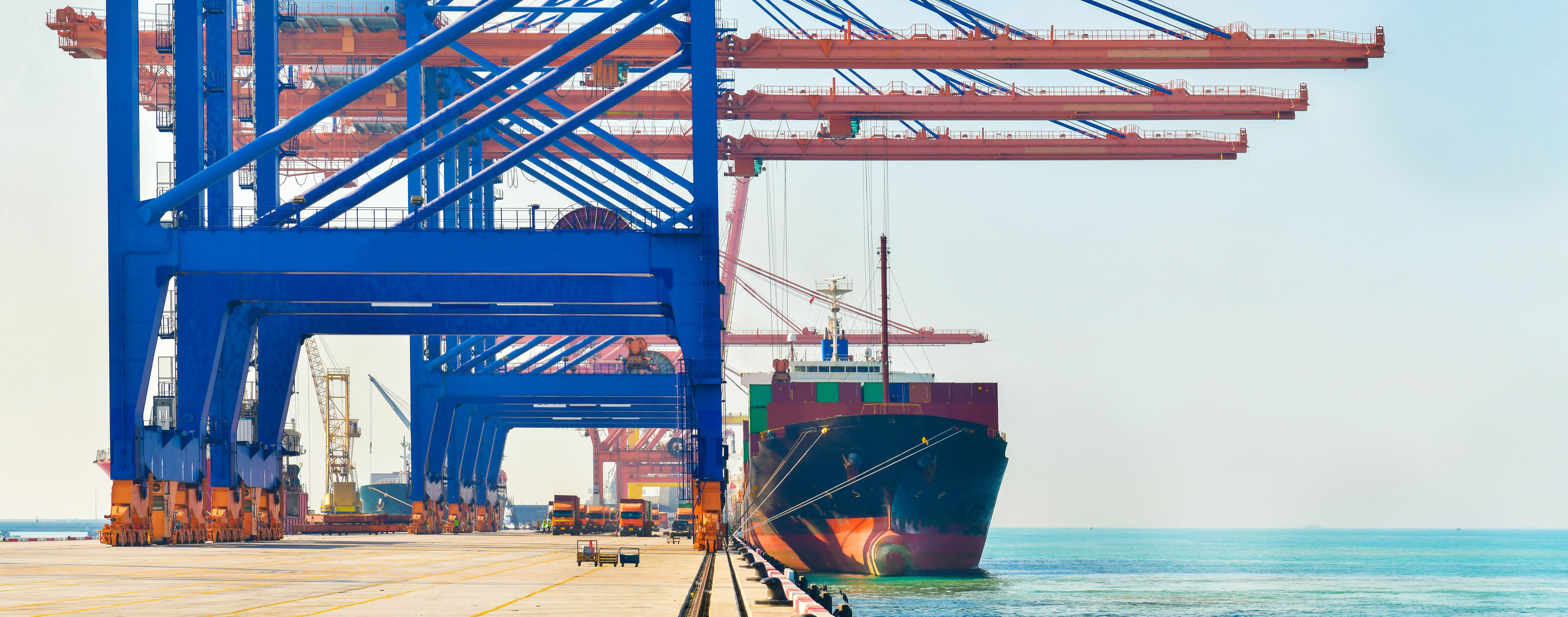 Industrial logistics and transportation of truck in Container yard for logistic and Cargo business in the shipping port,banner side