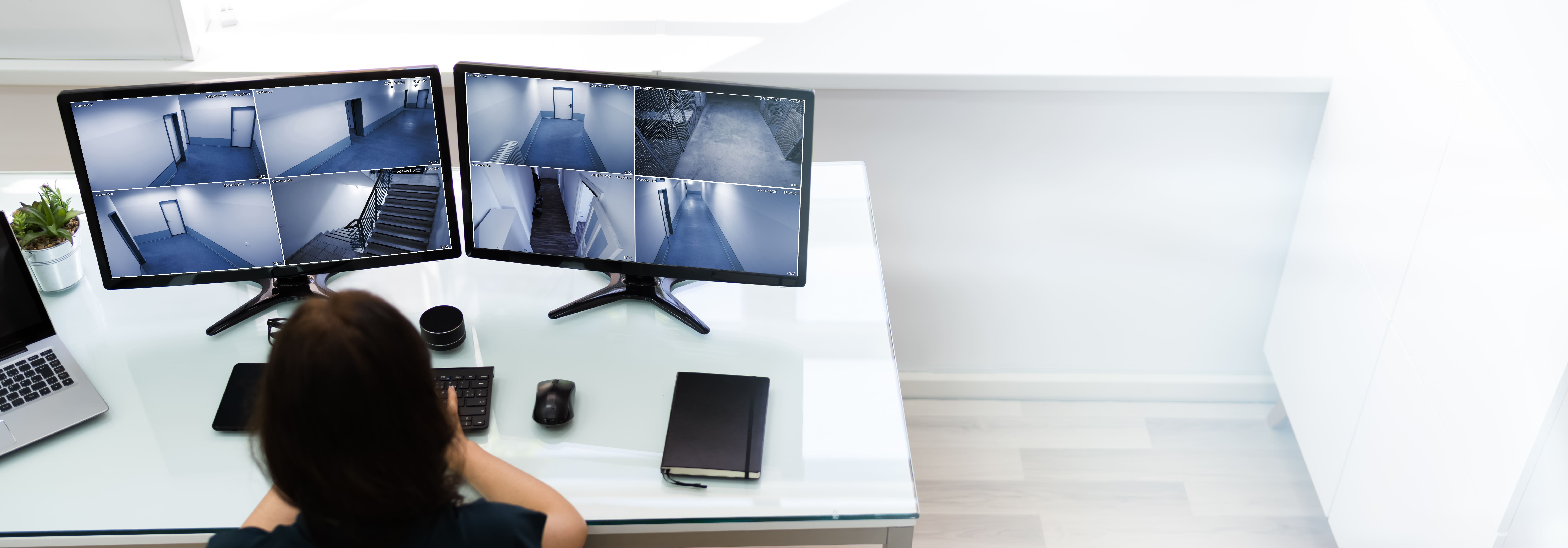 Corporate CCTV Surveillance On Multiple Monitor Screens